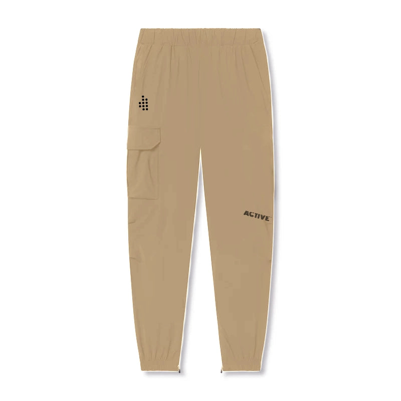 ACTIVE_254 -  SAND BROWN JOGGERS (WITH BLACK PRINTS)